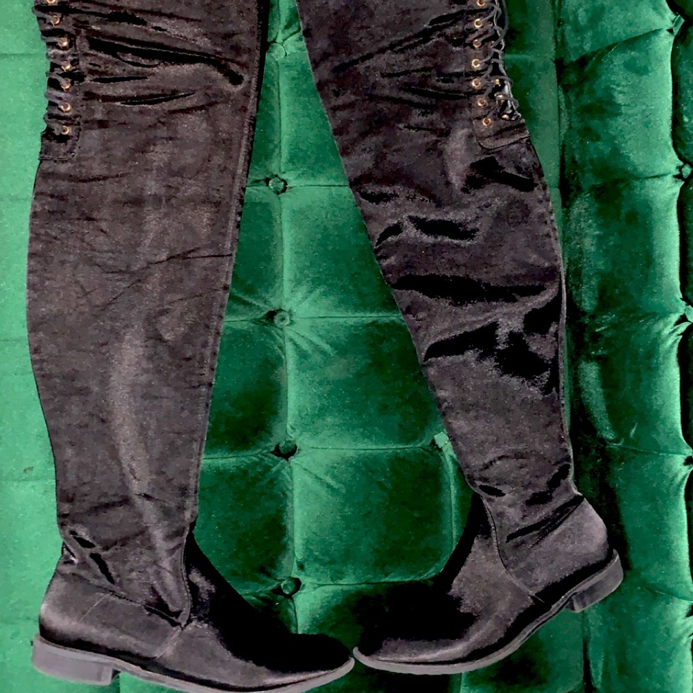 Thigh high flat boots